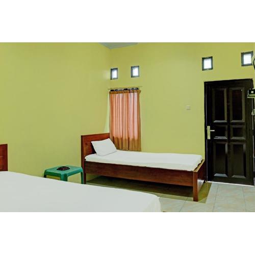 Capital O 92316 Wisma Widya Loka Pratama Near Futsal Tebing Gading