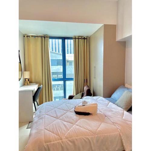 Central Cozy Suite at 38 Park Avenue, Cebu IT Park with Pool & Gym Access, and Netflix-Ready