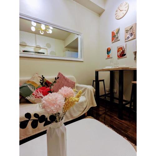 Charming Comfort 1BR at Air Residences Makati with wifi & netflix