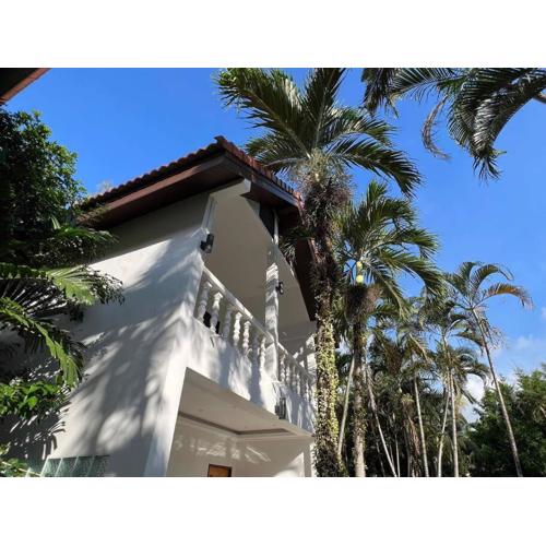 Charming Villa Suite with Balcony near Beach