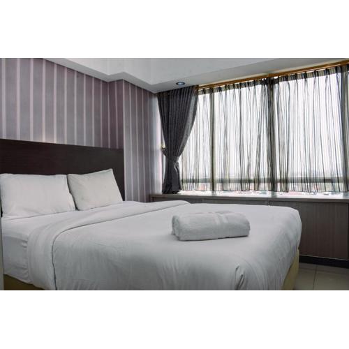 Chic and Cozy 1BR Apartment at H Residence near MT Haryono By Travelio