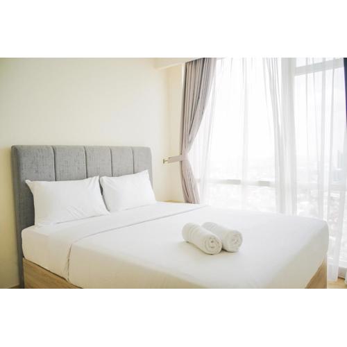 Chic and Cozy 2BR Apartment at Menteng Park By Travelio