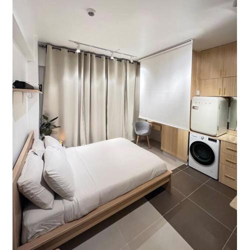 Chic & Cozy Apartment Near BGC with Home Theater Setup