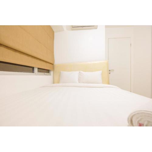 City View 2BR at Bassura City Apartment By Travelio