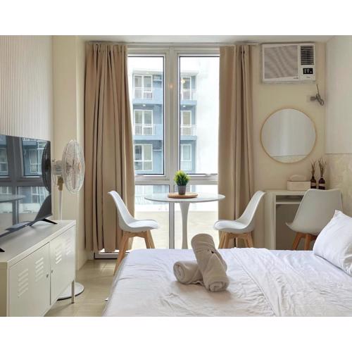 City View Condo in Pasig with Pool, WiFi and Netflix