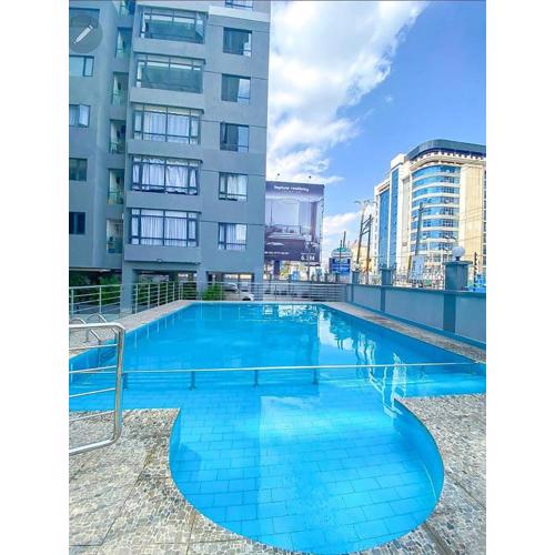 Classy executive two bedroom apartment with fully equipped gym ample parking space heated swimming pool children playing ground and amazing breathtaking city views