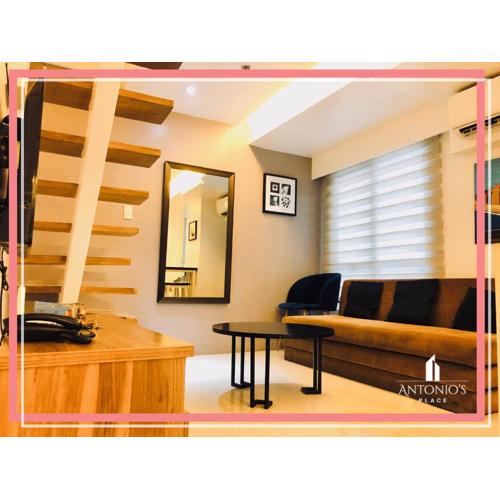 Classy Smart Designed 2BR Loft Unit FREE WIFI & NETFLIX at Fort Victoria BGC