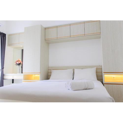 Clean and Comfort 2BR Apartment M-Town Residence By Travelio