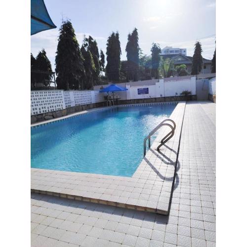 Coastal Bliss 1BR Nyali, pool, WiFi, walk to the beach