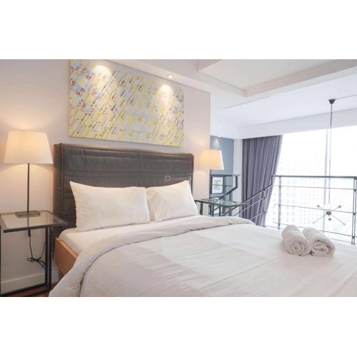 Comfort 1BR at CityLofts Sudirman Apartment By Travelio