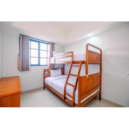 Comfort 1BR at Evenciio Margonda Apartment By Travelio