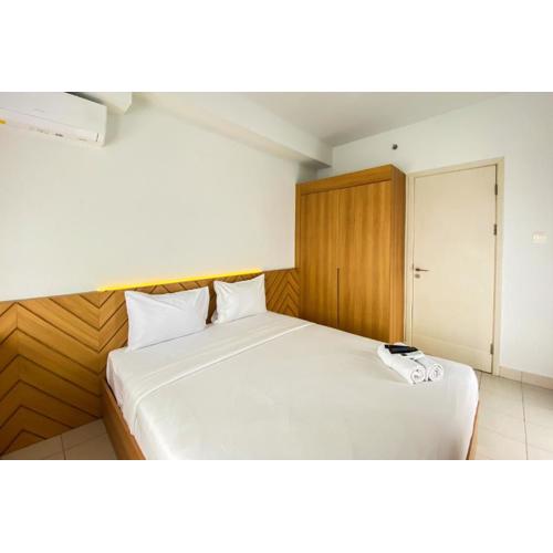 Comfort 1BR at Patraland Urbano Apartment By Travelio