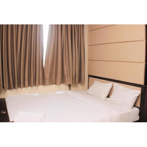 Comfort 1BR at Sky Terrace Apartment By Travelio