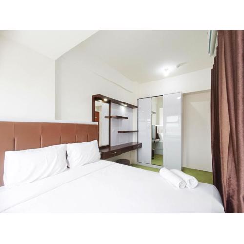 Comfort 1BR at Vida View Makassar Apartment By Travelio