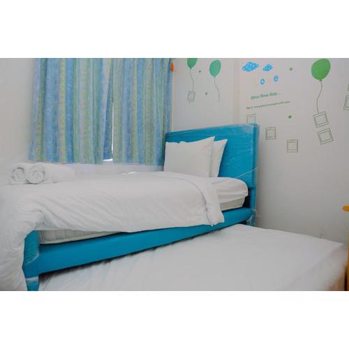 Comfort 1BR with Study Room Menteng Square Apartment By Travelio