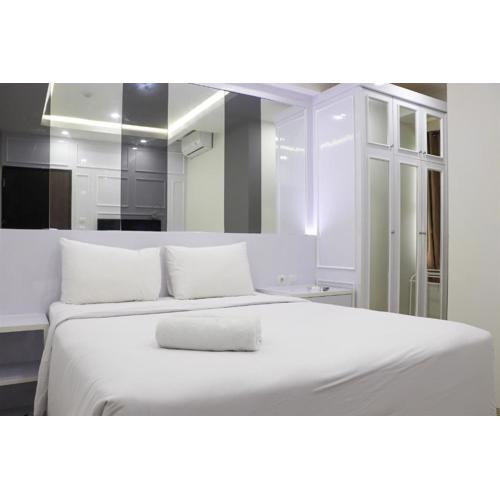 Comfort 2BR Apartment at 30th Floor Transpark Cibubur By Travelio