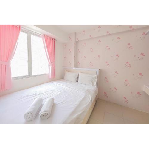 Comfort 2BR Apartment at Bassura City By Travelio