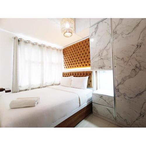 Comfort 2BR at 28th Floor Vida View Makassar Apartment By Travelio