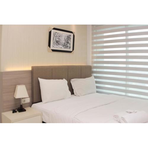 Comfort 2BR at Grand Kamala Lagoon Apartment By Travelio