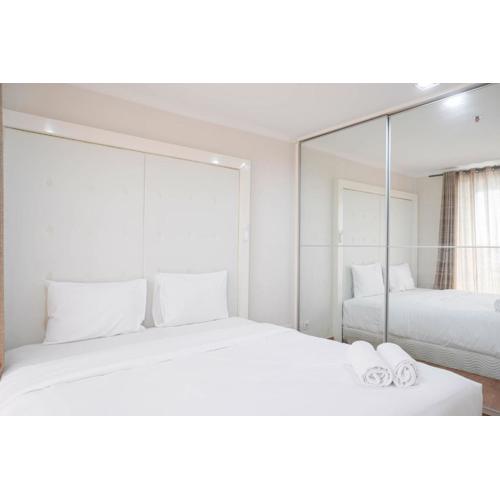 Comfort 2BR at Green Central City Glodok Apartment By Travelio