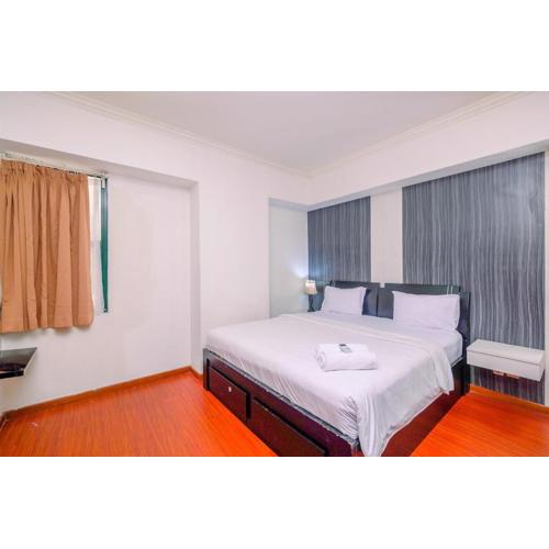 Comfort 2BR + Extra Room at Sudirman Tower Condominium Apartment By Travelio