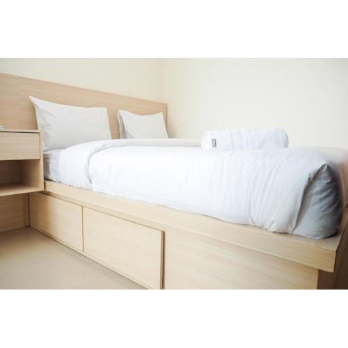 Comfort and Cozy 2BR Apartment Parahyangan Residence By Travelio