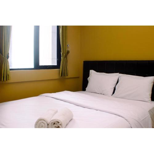 Comfort and Cozy Designed 2BR at Meikarta Apartment By Travelio