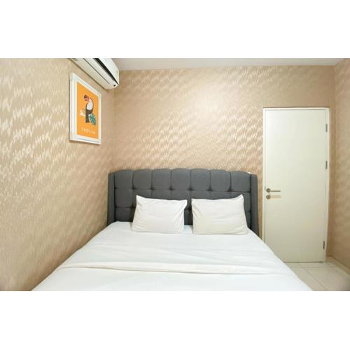 Comfort and Elegant 4BR Combined at Springlake Summarecon Bekasi Apartment By Travelio