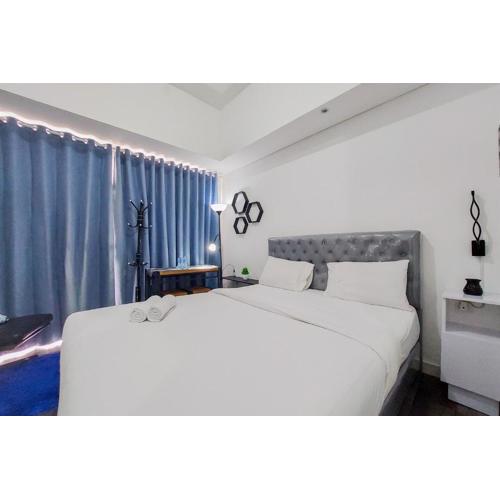 Comfort and Enjoy Living Studio Room at Casa de Parco Apartment By Travelio