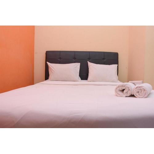 Comfort and Homey 2BR at Green Pramuka City Apartment By Travelio