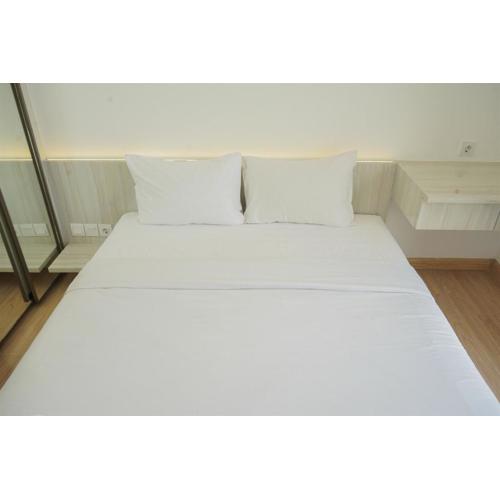 Comfort and Minimalist 2BR at Sky House BSD Apartment By Travelio