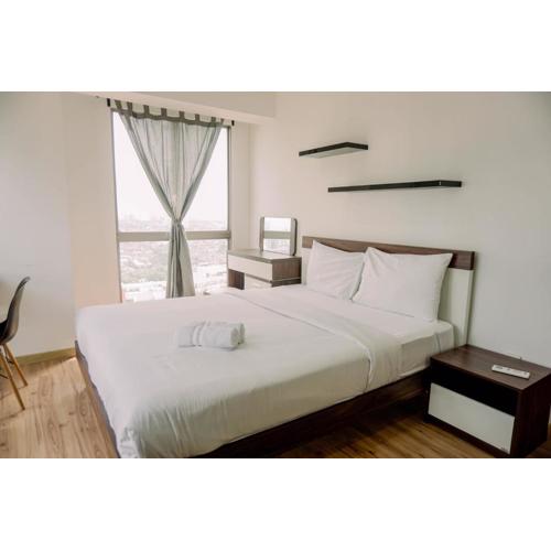 Comfort and Modern Look 2BR Apartment M-Town Signature By Travelio