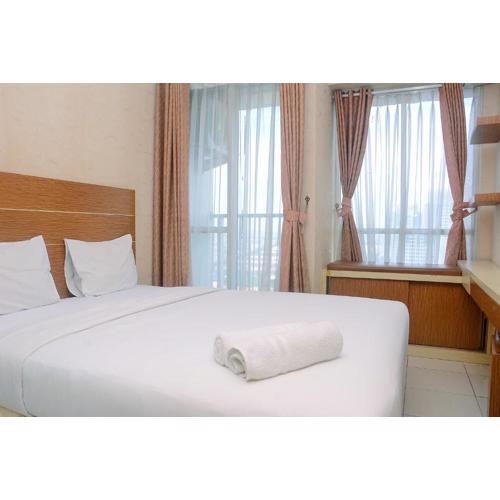 Comfort and Modern Studio Tifolia Apartment By Travelio