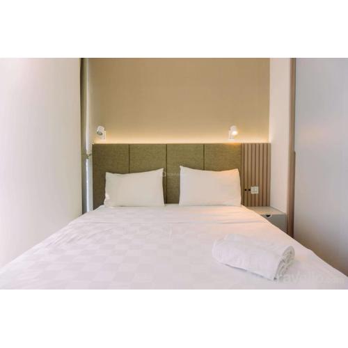 Comfort and Nice 2BR at Gold Coast Apartment By Travelio