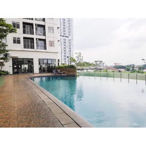 Comfort and Nice 2BR at Serpong Greenview Apartment By Travelio