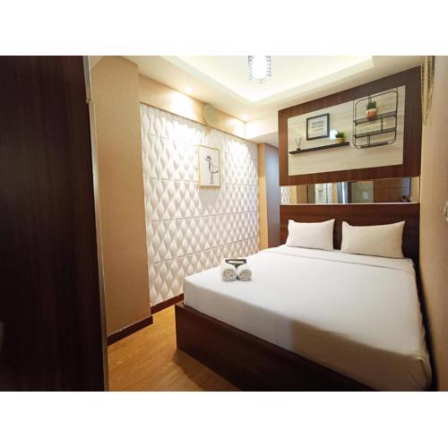 Comfort and Strategic 2BR Apartment at Vida View Makassar By Travelio