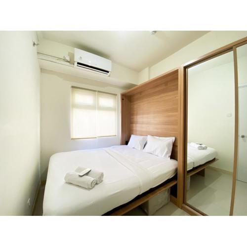 Comfort and Strategic 2BR at Green Pramuka City Apartment By Travelio