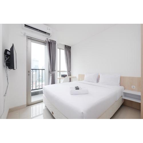 Comfort and Warm Studio at Ciputra World 2 Apartment By Travelio