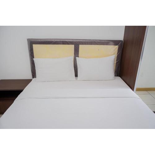 Comfort and Warm Studio Room Apartment at M-Town Residence By Travelio