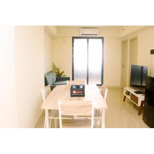 Comfort and Well Design 2BR with Working Room at Meikarta Apartment By Travelio