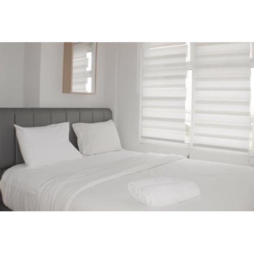 Comfort Living 3BR at Springlake Summarecon Bekasi Apartment By Travelio