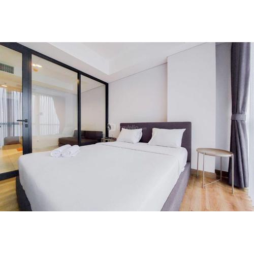 Comfort Living and Homey 1BR The Smith Alam Sutera Apartment By Travelio