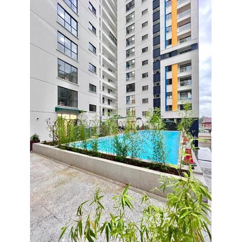 Comfort living one bedroom apartment with fully equipped gym heated swimming pool private parking space,child play area and amazing scenic views