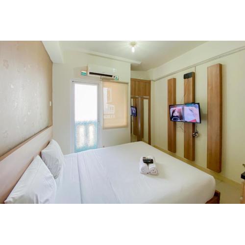 Comfort Living Studio at 20th Floor Green Pramuka City Apartment By Travelio