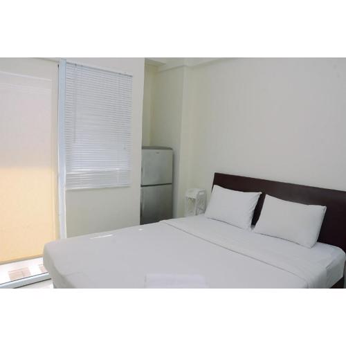 Comfort Studio at Green Pramuka City Apartment near Shopping Center By Travelio