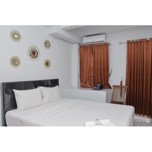 Comfort Studio at Patraland Urbano Apartment By Travelio