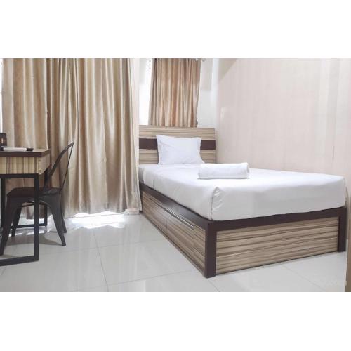 Comfort Studio at Vida View Makasar Apartment By Travelio