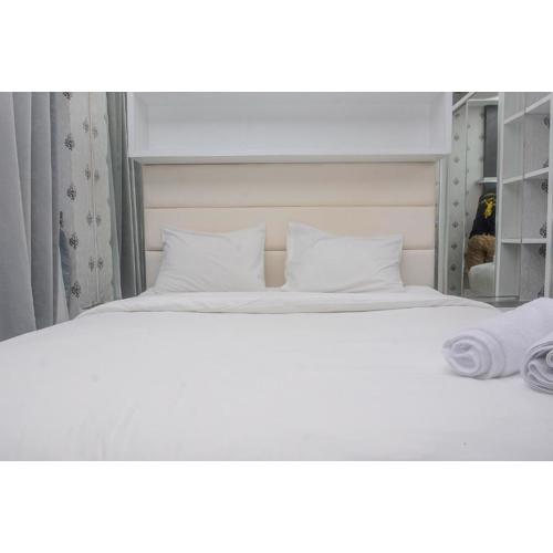 Comfort with City View Studio Tifolia Apartment By Travelio