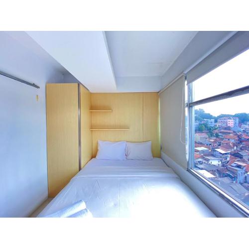 Comfortable 2BR Apartment AC in Living Room at The Jarrdin Cihampelas By Travelio