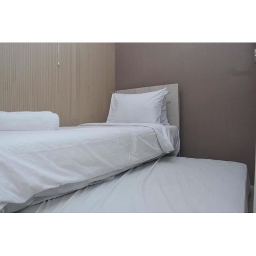 Comfortable 2BR Apartment at Bassura City By Travelio